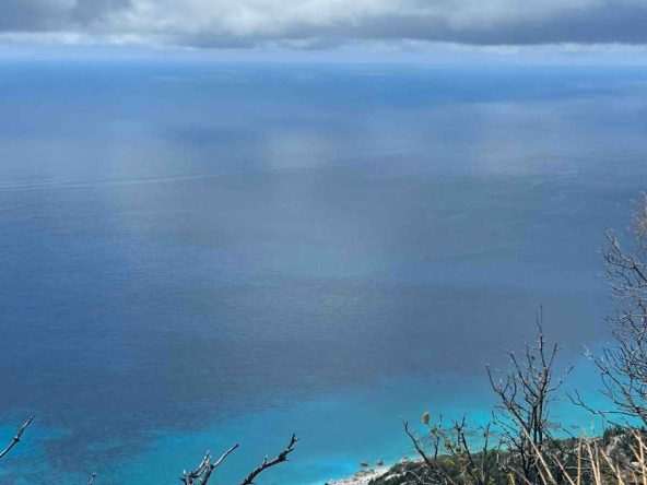 Breathtaking beach view from the Kalamitsi Lefkada Sea View Land, highlighting the plot's scenic location and building potential.