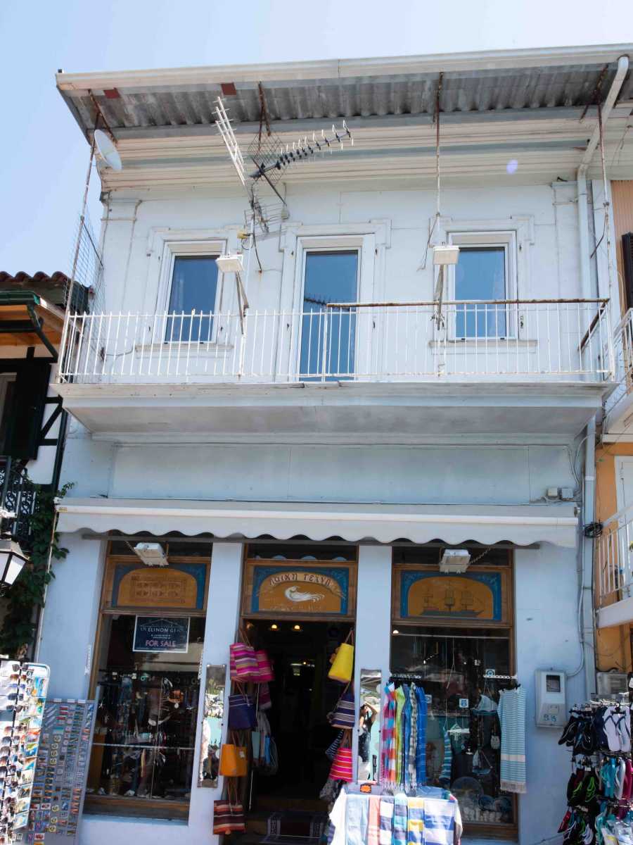 View of the 85 square metre Vasiliki Port Shop Lefkada, located in a bustling and central marina area.
