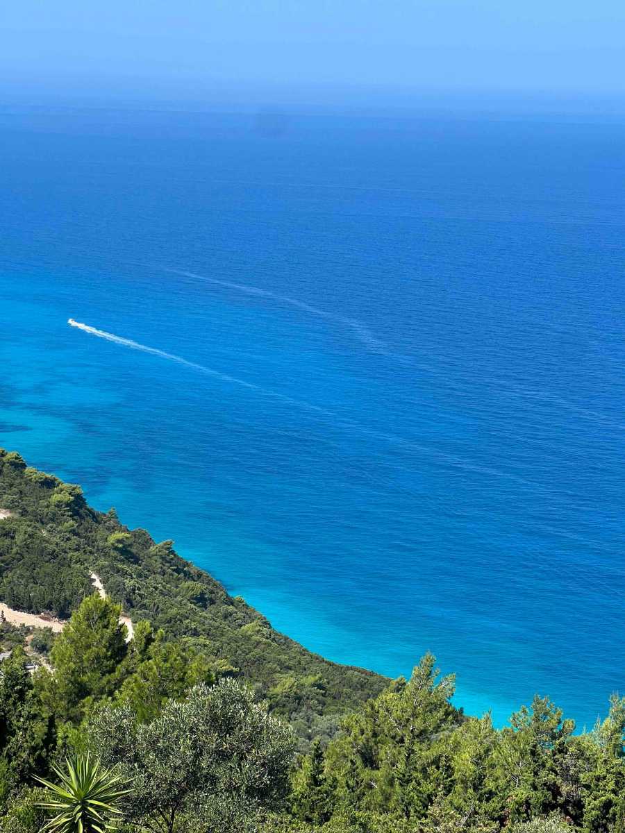 Spectacular beach view from the balcony of the Tsoukalades Beachview Apartment, showcasing the serene and picturesque coastline.