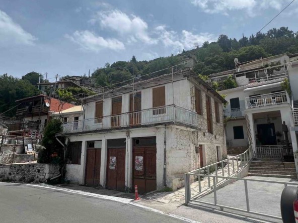 Traditional Greek Exanthia Village House Lefkada, featuring classic architecture and a picturesque setting