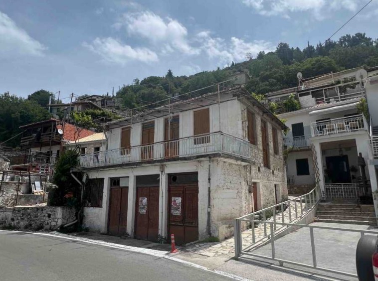 Traditional Greek Exanthia Village House Lefkada, featuring classic architecture and a picturesque setting