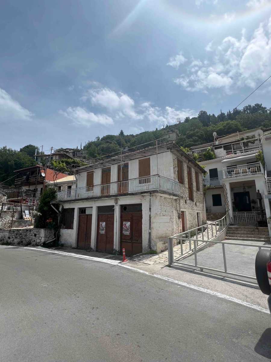Traditional Greek Exanthia Village House Lefkada, featuring classic architecture and a picturesque setting