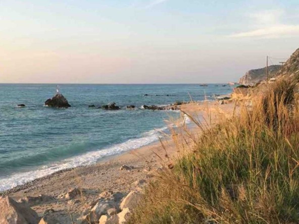 A pristine view of beachfront land in Kalamitsi, ideal for property investment.