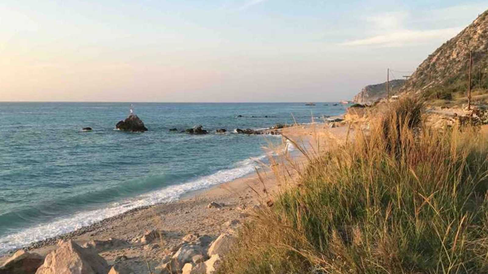 A pristine view of beachfront land in Kalamitsi, ideal for property investment.