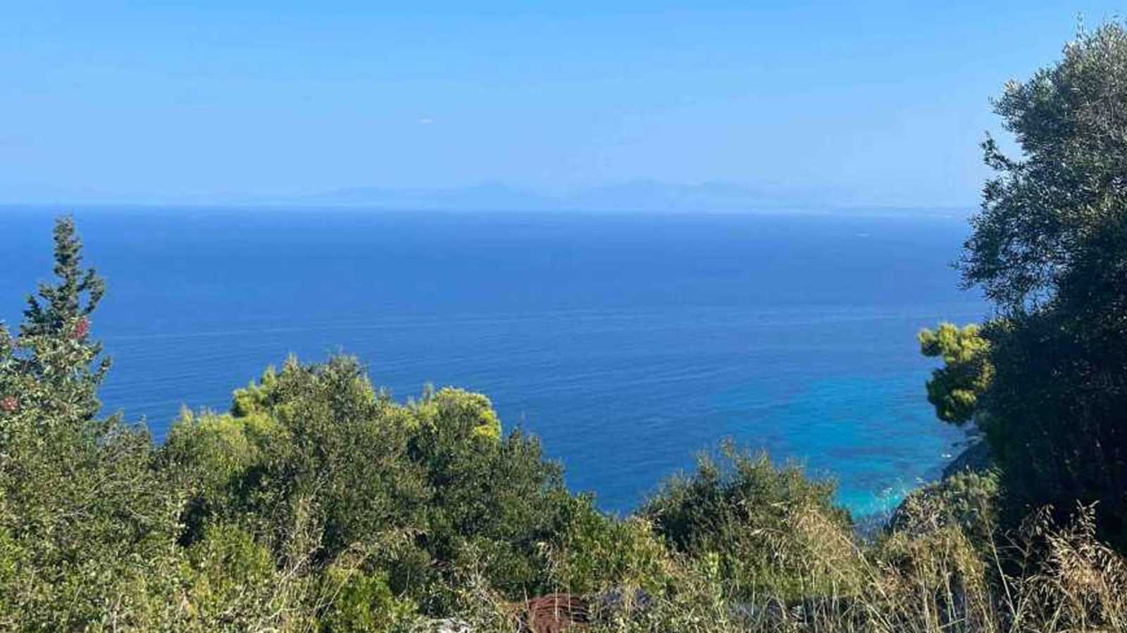 A panoramic sea view from a hill, illustrating the premium quality of land for sale in Tsoukoulades.