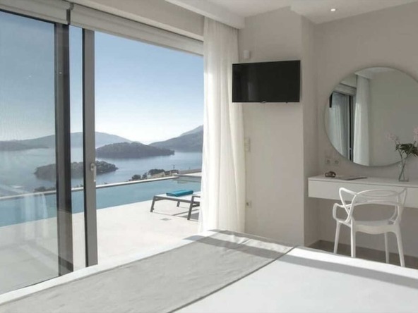 Sea-view bedroom in a Lefkada rental villa, illustrating the high standards of the Lefkada Rental Market