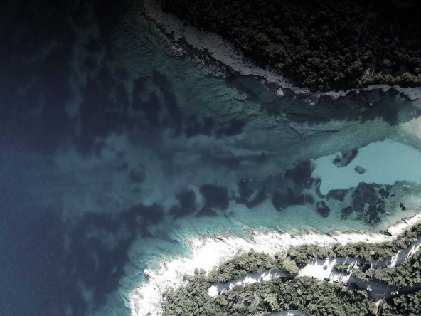 Aerial view of prime land by the beach available through Porto Katsiki Lefkada Real Estate