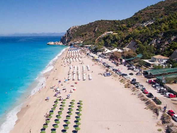 The mesmerising beach of Kathisma, Lefkada, highlights the allure of land for sale in the area.