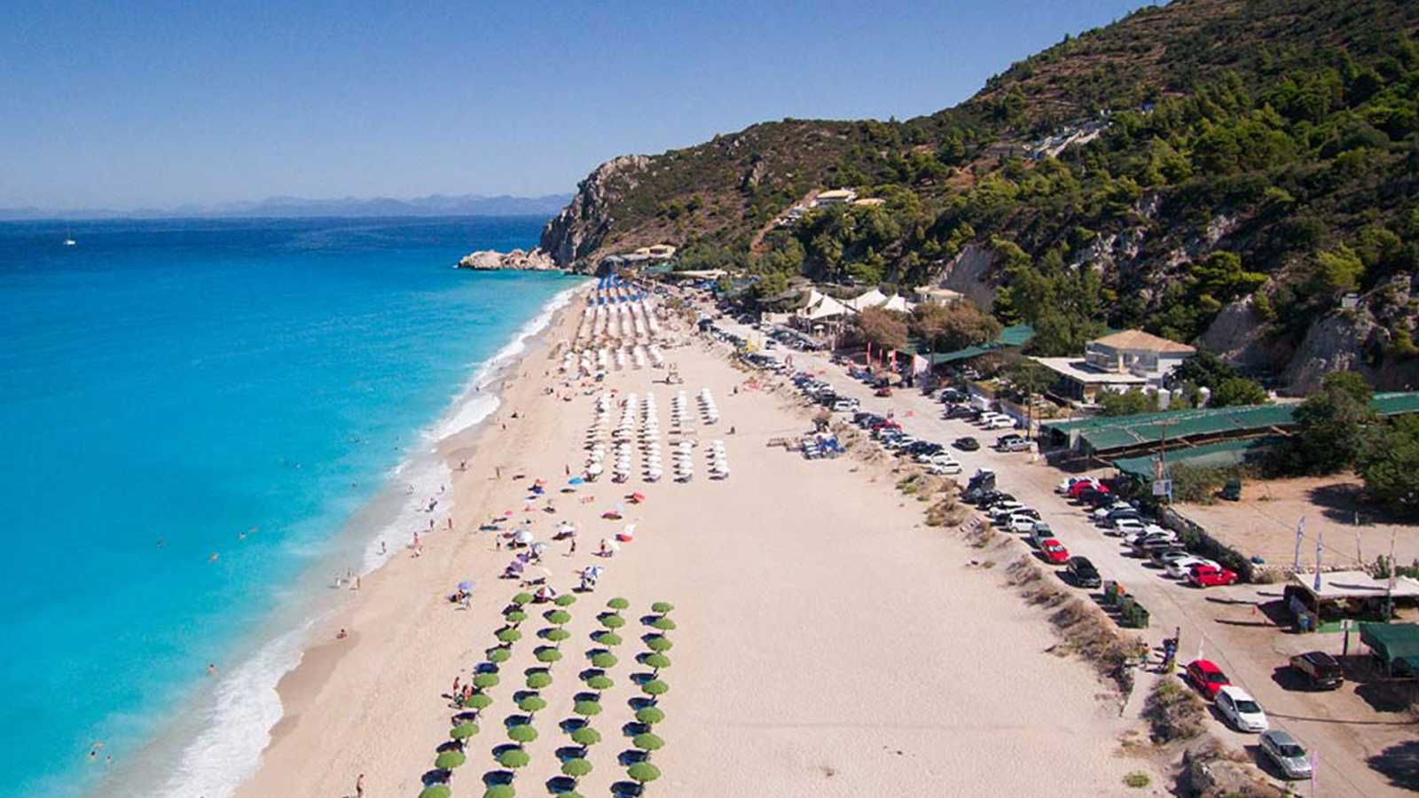 The mesmerising beach of Kathisma, Lefkada, highlights the allure of land for sale in the area.